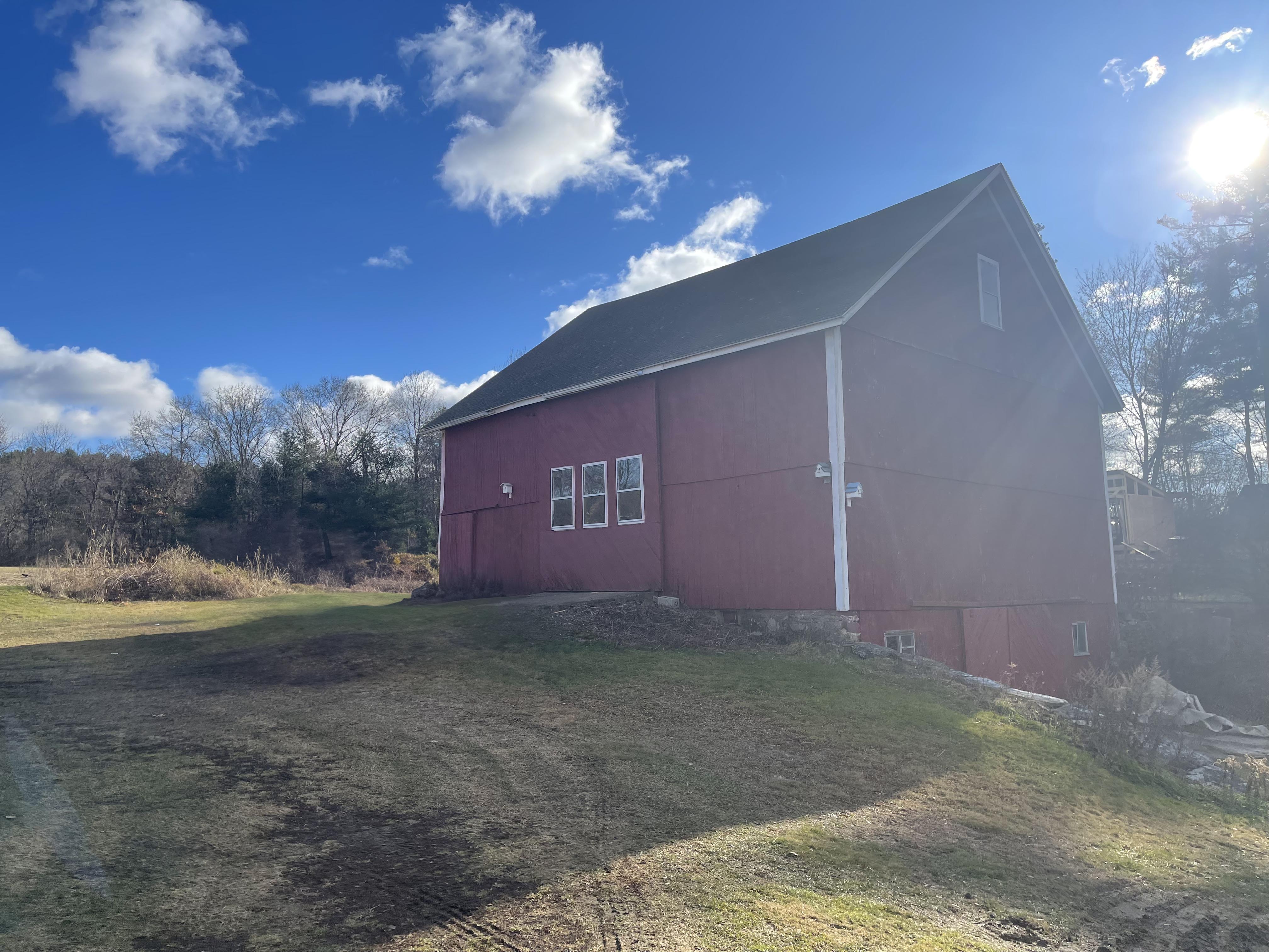 Historic barn on the planned Creative Clay Center property in Oxford, Massachusetts